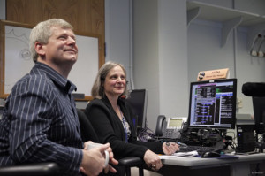 New Horizons Mission Operations Manager Alice Bowman and operations team member Karl Whittenburg watch the screens for data confirming that the New Horizons spacecraft had transitioned from hibernation to active mode on Dec. 6. Credit: APL 