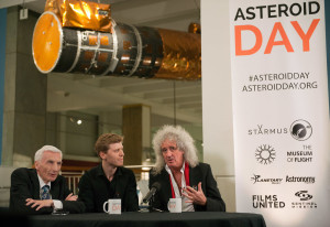 Taking part in a London presentation to promote Asteroid day, Lord Martin Rees, Grigorij Richters, and Dr. Brian May, astrophysicist and famed guitarist for the rock band Queen. Photo by Max Alexander/Asteroid Day - London
