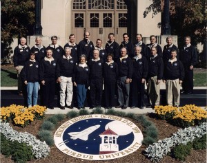 The Orion test flight carries this photo of Purdue alumni astronauts into space. The photo was taken during their reunion on Purdue's campus in 1999.  Credit: Purdue University