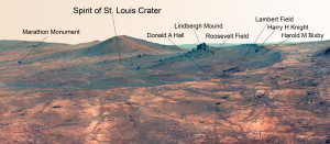 The “Spirit of St. Louis Crater” and a rock spire called “Lindbergh Mound” are shown in this false-color image from Opportunity’s panoramic camera (Pancam). The names carry references to Charles Lindbergh’s ocean crossing in the airplane Spirit of St. Louis, designed by Charles D. Hall. Lindbergh named the plane to recognize financial backing for the flight from St. Louis residents, including Harold M. Bixby and Harry H. Knight. Credit: NASA/JPL-Caltech/Cornell Univ./Arizona State Univ.   