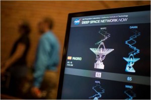A monitor shows the status of NASA's Deep Space Network as confirmation is received from the New Horizons spacecraft that it has completed the flyby of Pluto, Tuesday, July 14, 2015 at the Johns Hopkins University Applied Physics Laboratory (APL) in Laurel, Maryland.  Credit: NASA/Joel Kowsky