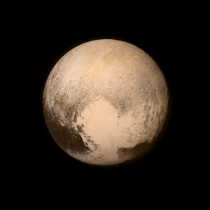 Pluto nearly fills the frame in this image from the Long Range Reconnaissance Imager (LORRI) aboard NASA’s New Horizons spacecraft, taken on July 13, 2015 when the spacecraft was 476,000 miles (768,000 kilometers) from the surface. This is the last and most detailed image sent to Earth before the spacecraft’s closest approach to Pluto on July 14. The color image has been combined with lower-resolution color information from the Ralph instrument that was acquired earlier on July 13. This view is dominated by the large, bright feature informally named the “heart,” which measures approximately 1,000 miles (1,600 kilometers) across. The heart borders darker equatorial terrains, and the mottled terrain to its east (right) are complex. However, even at this resolution, much of the heart’s interior appears remarkably featureless -- possibly a sign of ongoing geologic processes.   Credit: NASA/APL/SwRI
