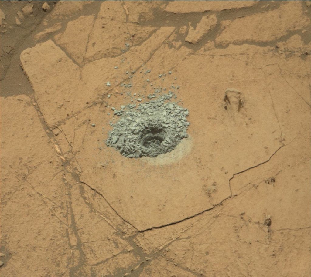 Curiosity Mars Rover Analyzing Drill Powder
